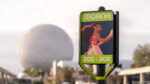 Moana-themed Disney World parking lot sign at Epcot with spaceship Earth in the background, featuring Moana illustration and row numbers 305-308