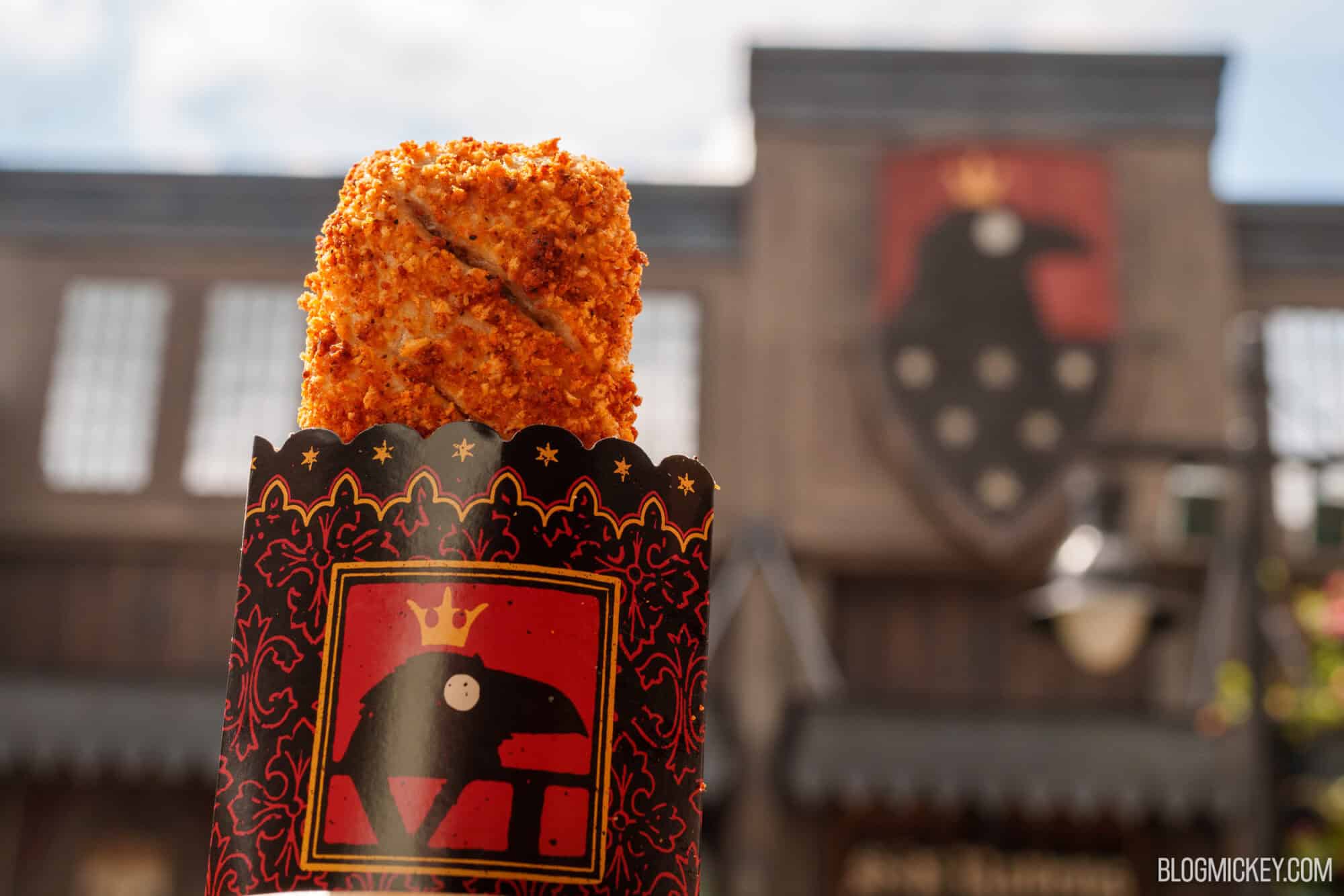 Crispy fried chicken served in themed packaging at Disney Springs.