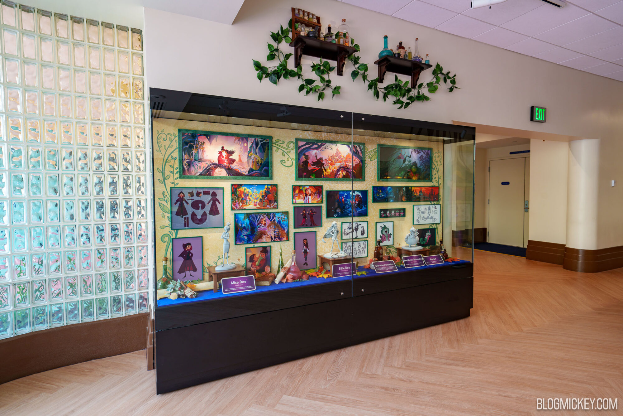 Display of character maquettes and concept art at Hollywood Studios.