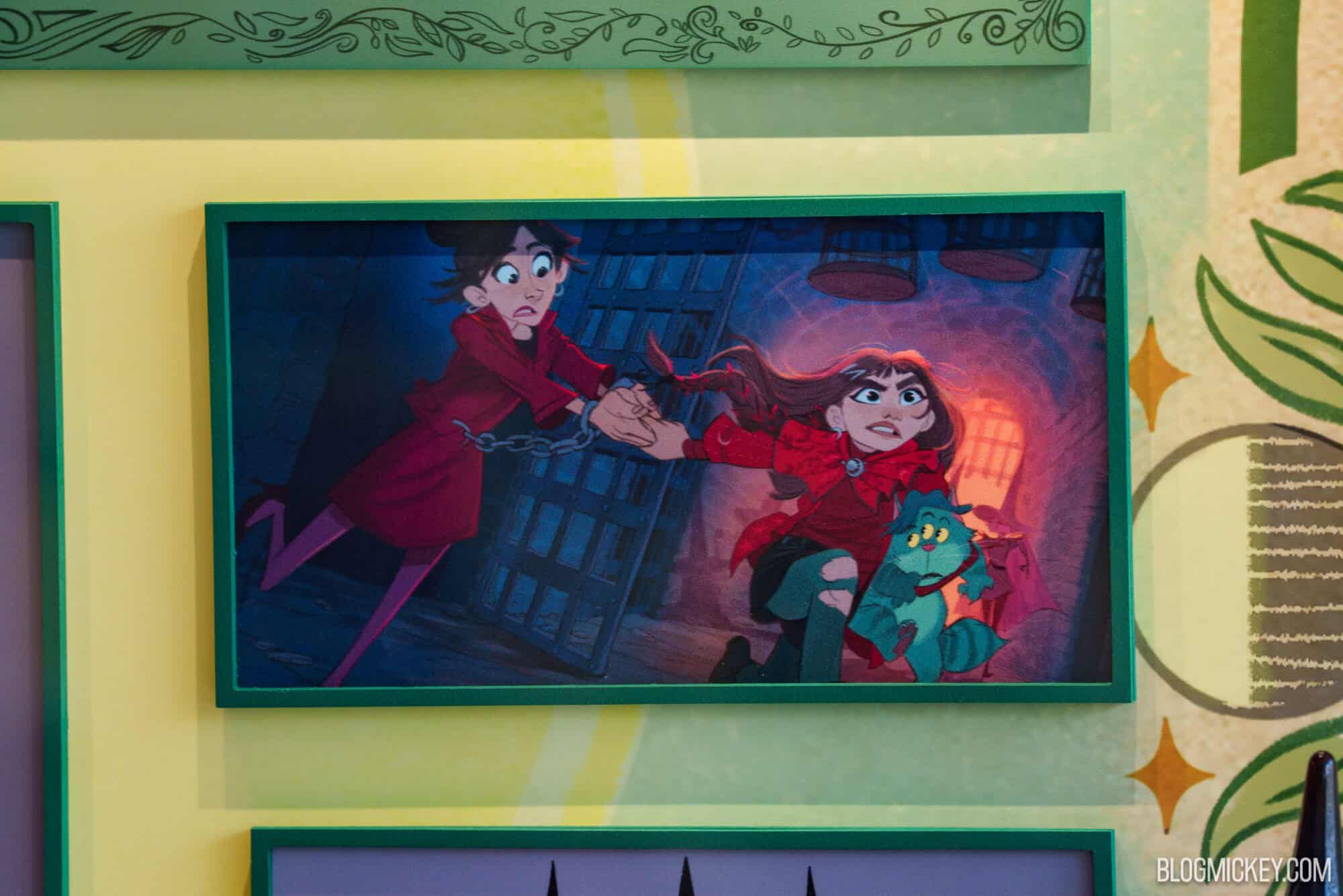 Disney animated characters on display at Hollywood Studios maquette exhibit.