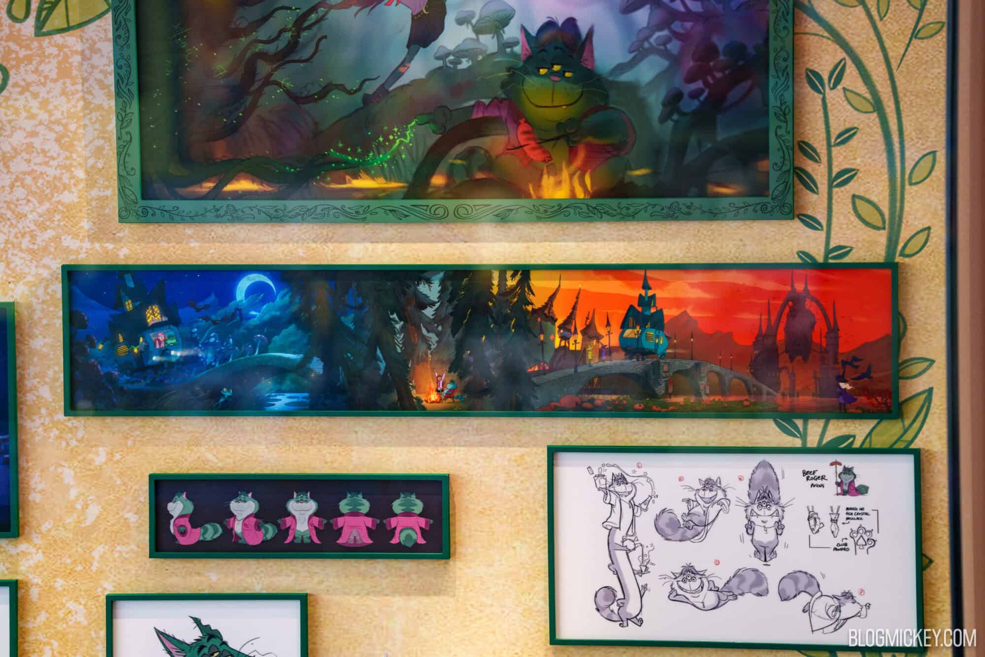 Gallery wall featuring Hexed character maquettes and fantasy art at Hollywood Studios.
