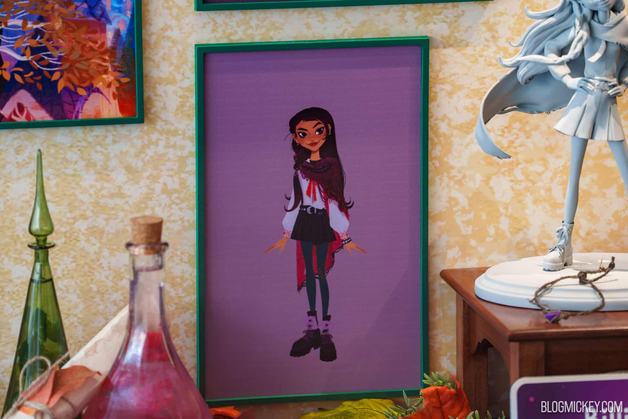 Framed character illustration on display at Hollywood Studios exhibit.